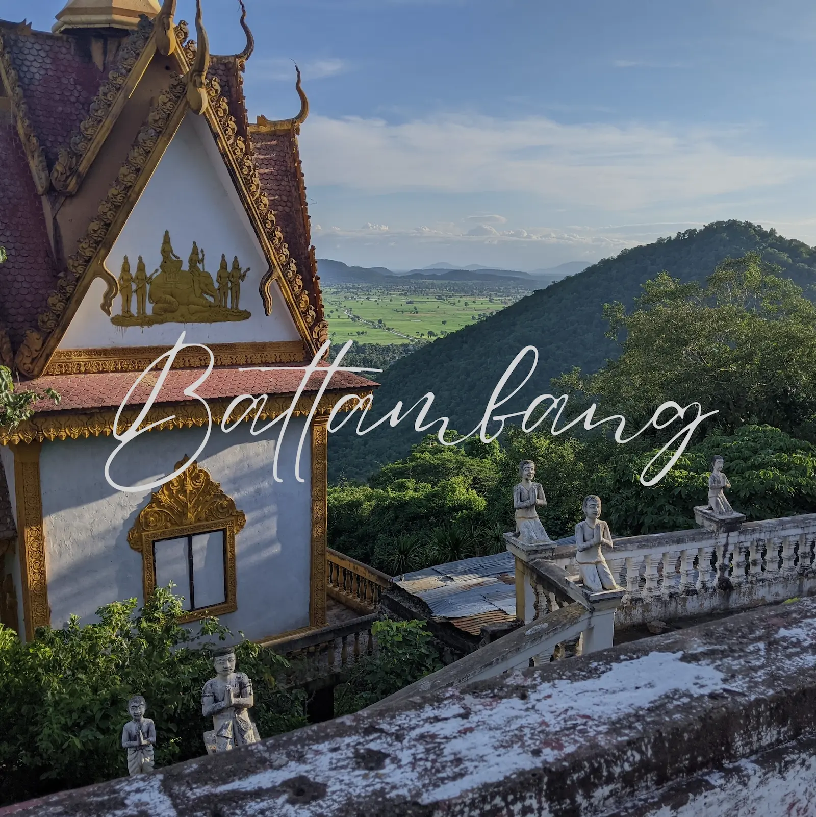 Temple buildings on top of Phnom Sampov mountain with rice fields stretching across the landscape below and text: Battambang