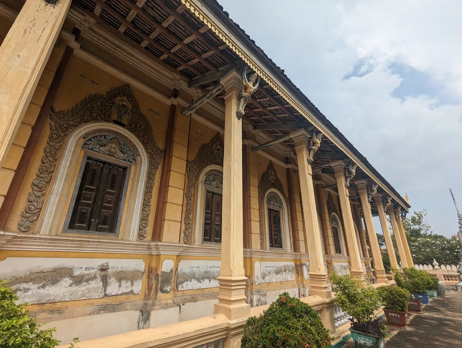 Close up shot of the outside of a pagoda with columns